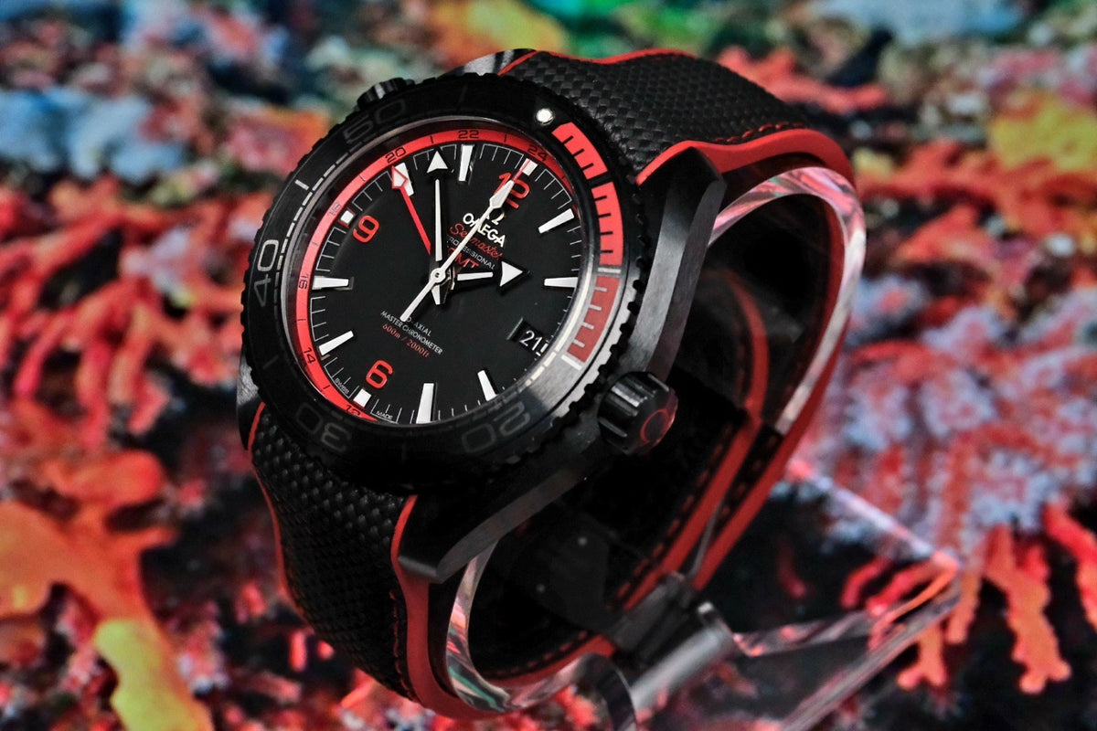 OMEGA Seamaster Planet Ocean 600M Deep Black GMT 215.92.46.22.01.003 — dial at an angle