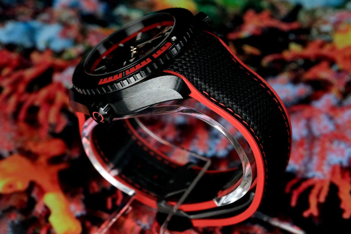 OMEGA Seamaster Planet Ocean 600M Deep Black GMT 215.92.46.22.01.003 — side profile